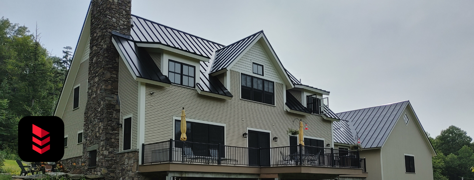 Modern home with standing seam metal roof installed by RoofPros.Plus